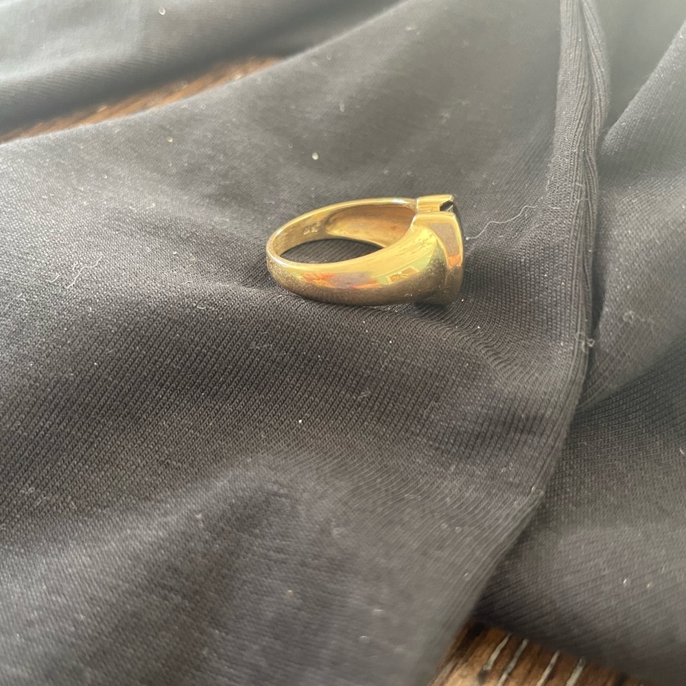 Black onyx ring in solid gold plating. Size 8. Classy.